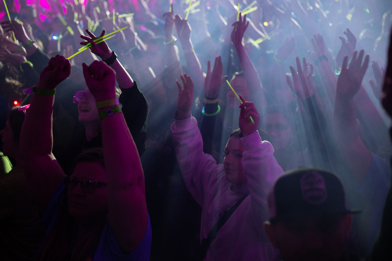 Glowsticks, loud music, and fog set the mood for dancers during DM29.