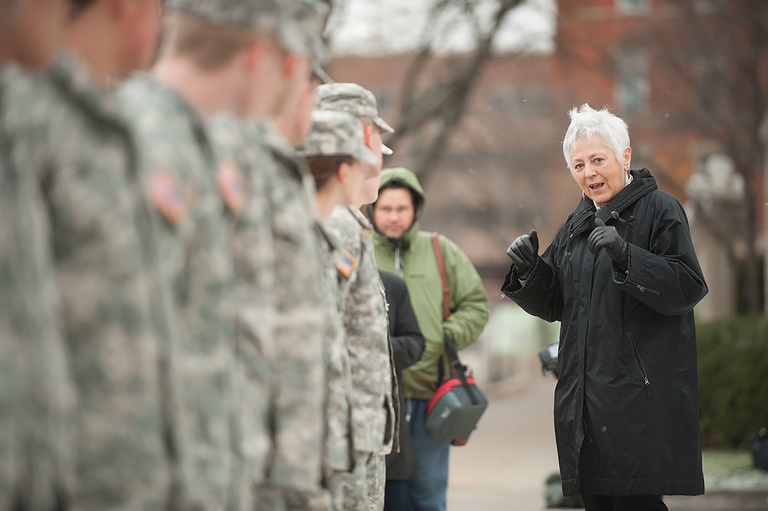 Sally Mason speaks at a Veterans Day ceremony on the Pentacrest in November 2014.