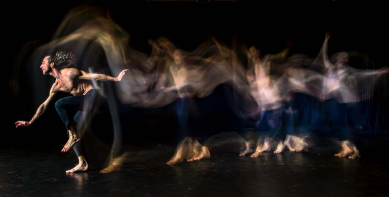 Photo of dancer using light painting technique