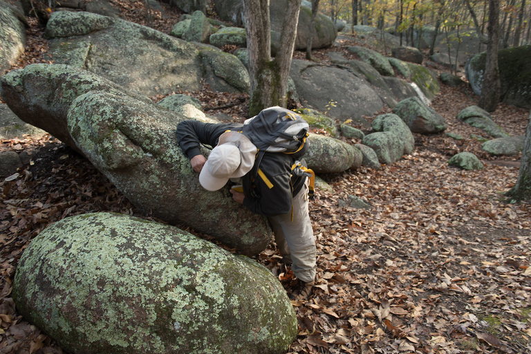 Mike Simon pokes around the trail at Elephant Rocks State Park. Giant granite boulders are scattered throughout the park. The largest, called “Dumbo,” is 27 feet tall, 34 feet long, 17 feet wide, and tips the scales at a hefty 680 tons. 