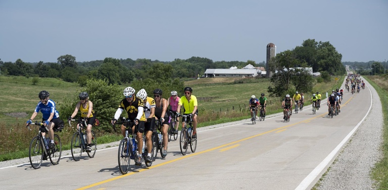 riders pass another barn