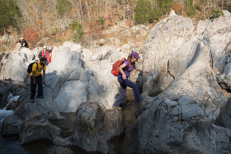 Ingrid Ukstins negotiates a gap among the serrated rocks at Johnson’s Shut-Ins State Park in Missouri. One of Ukstins’ research specialties is volcanism, and she has studied volcanic activity worldwide