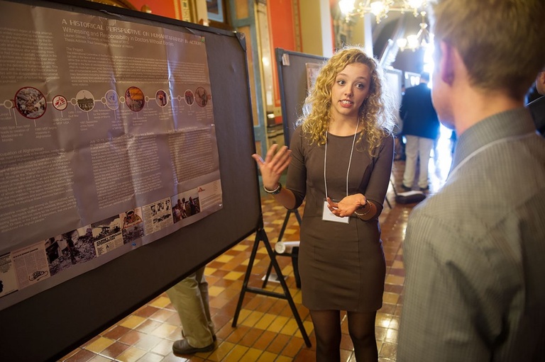 An Iowa student talks about her research during Research Day at the Capitol.