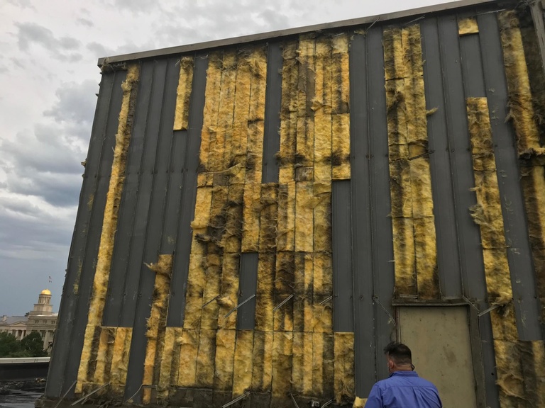 damaged siding and insulation 