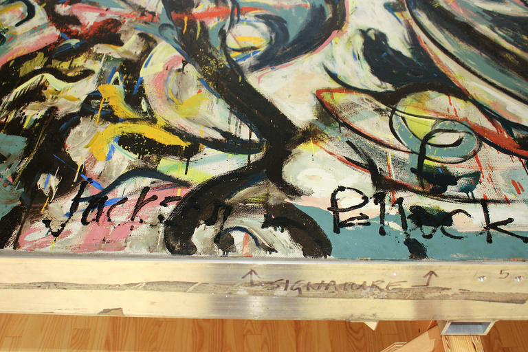 A close-up look of Jackson Pollock's signature at the bottom of "Mural."
