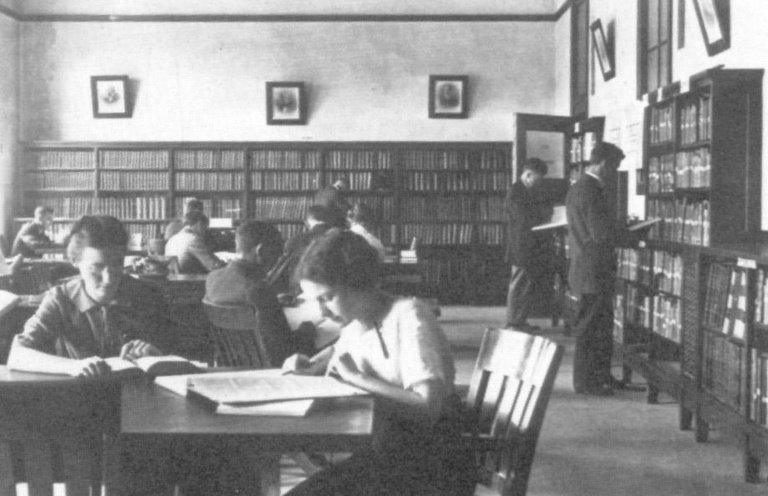 students reading physics library maclean hall 1920s