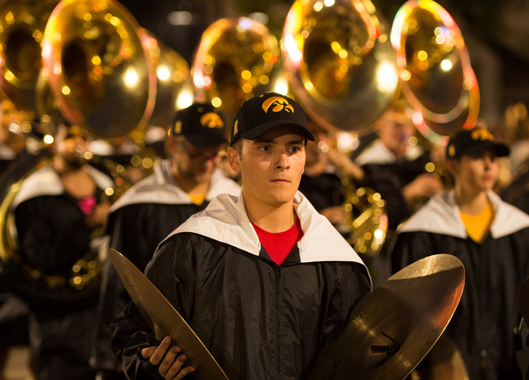 cymbal player in hawkeye marching band