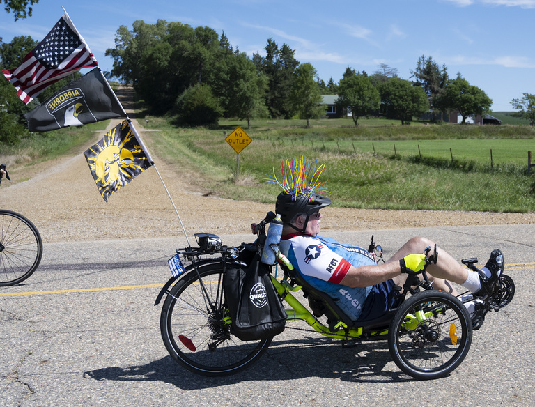 A member of the U.S. Air Force Cycling Team sports their favorite flags.