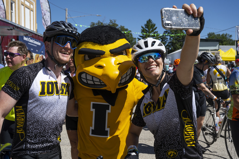 Iowa fans take a selfie with Herky on Thursday, July 28, in Marble Rock.