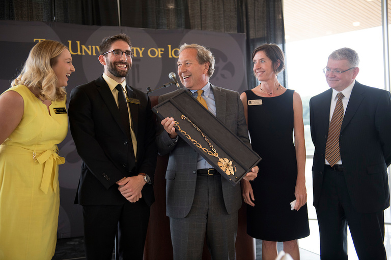 President Bruce Harreld receives the UI Presidential Medallion