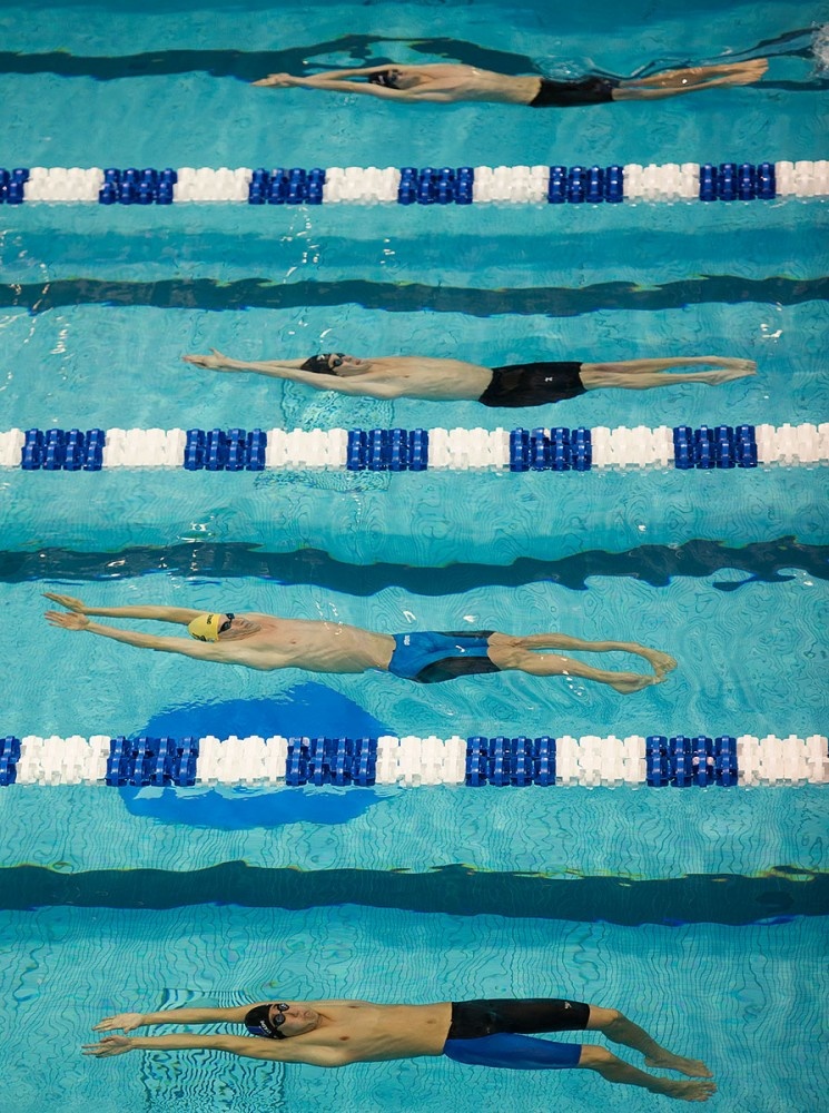 Backstrokers swimming underwater