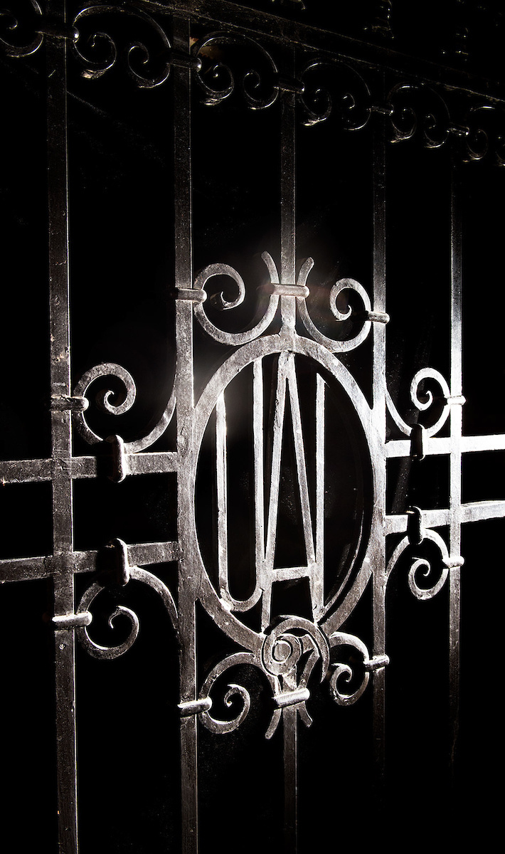 Detail of wrought-iron gate at Quadrangle Hall
