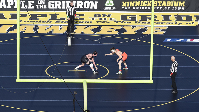 wrestlers competing in outdoor match