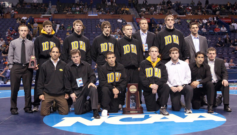 The Iowa Hawkeyes pose for a team photo after the tournament.