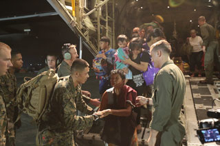U.S. marines help victims of Typhoon Hayan