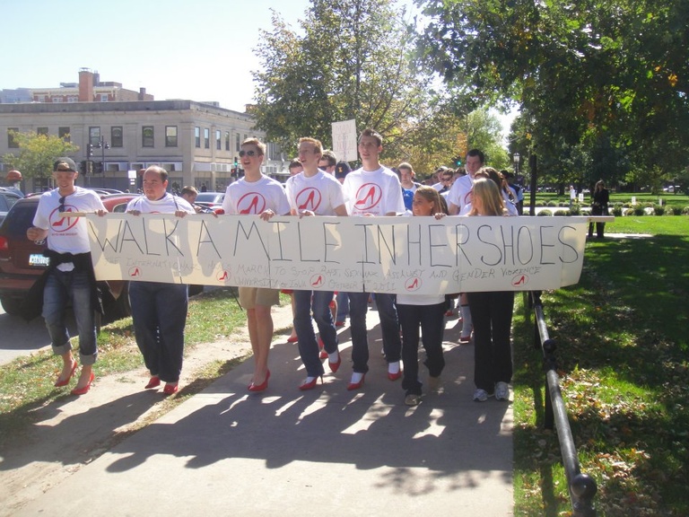 Participants march in the 2011 Walk A Mile in her Shoes