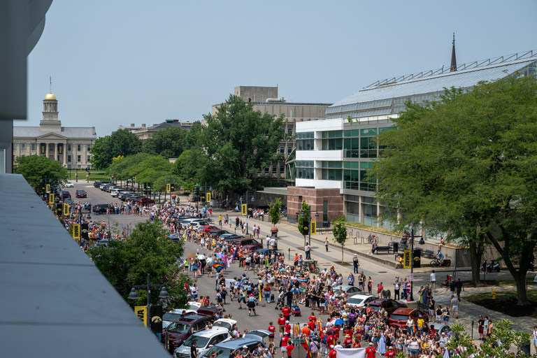 A view of the Iowa City Pride Parade from the Tower Place parking ramp.