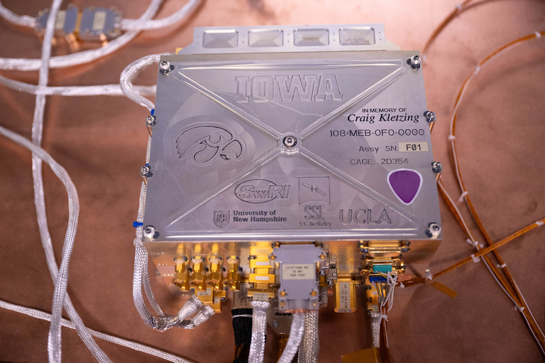 The main electronics box for the TRACERS mission includes an embedded guitar pick to honor Craig Kletzing, the renowned Iowa physics professor who conceived the mission, won the funding, and led TRACERS until his death in August 2023. Kletzing played electric and acoustic guitar in a Grateful Dead-inspired band, called Fork in the Road, that jammed throughout Iowa City.