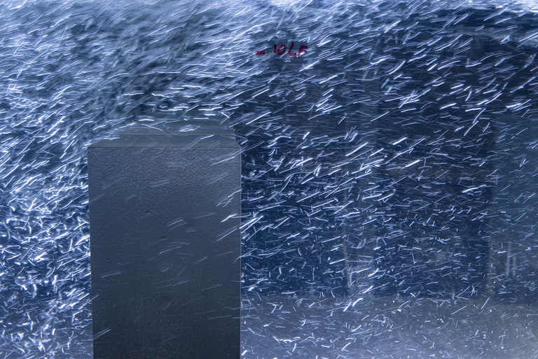 An onrushing flow of water is calmed by one of many baffles, vertical blocks placed strategically to calm and smooth out the cascade of water before it’s sent down a long chute into a storage basin