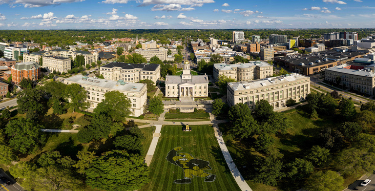 Aerial view of the Pentacrest with Herky painted on the lawn
