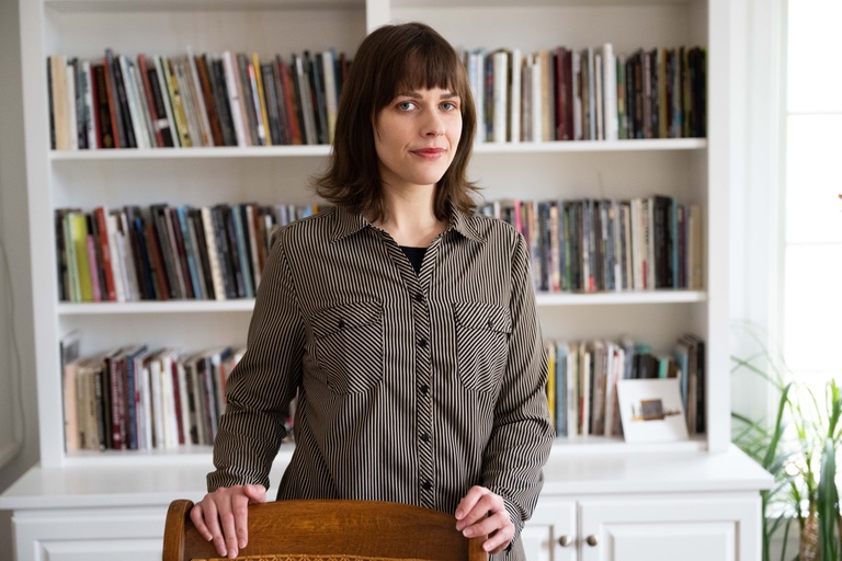 UI professor and author Paige Lewis