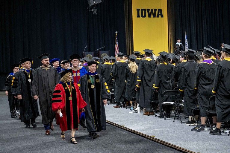 Tippie Dean Amy Kristof-Brown and Provost Kregel lead the processional