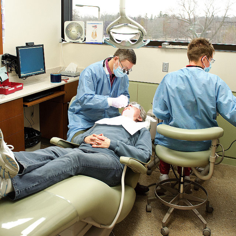 A patient is cared for in a dental clinic.