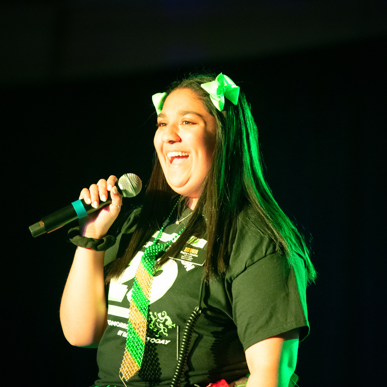 Executive director of Dance Marathon Raginya Handoo addresses attendees of DM29.