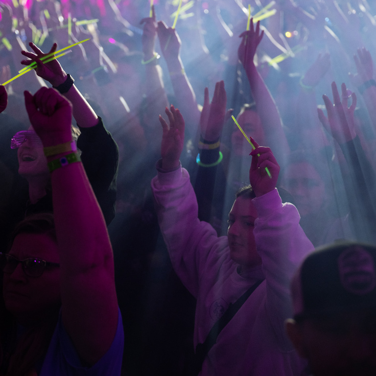 Glowsticks, loud music, and fog set the mood for dancers during DM29.