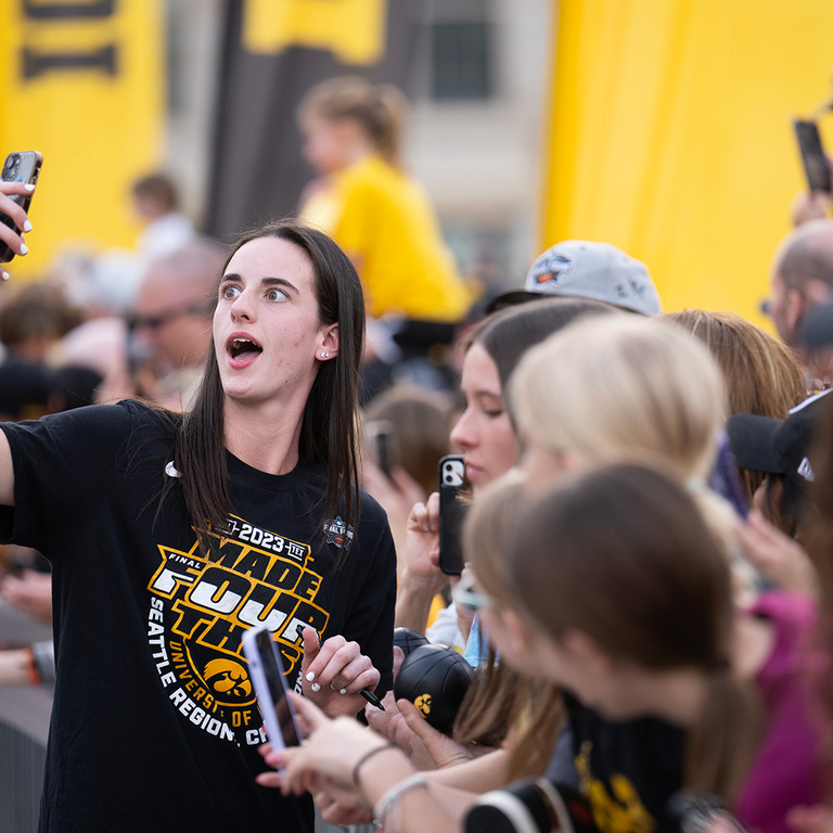 Caitlin Clark poses for a selfie
