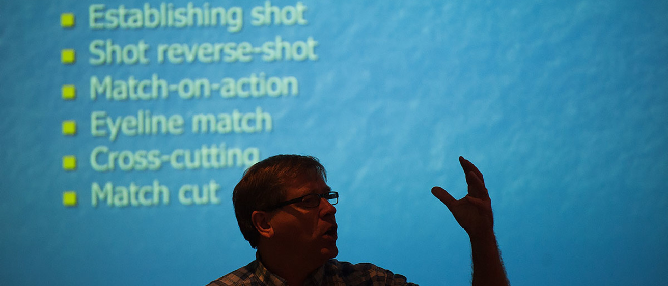 Timothy Havens lectures in front of a screen