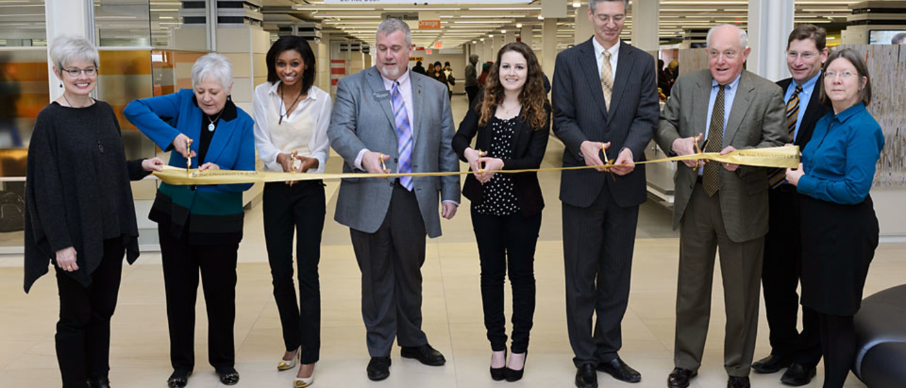 University of Iowa dignitaries cut a ribbon to open the new Learning Commons