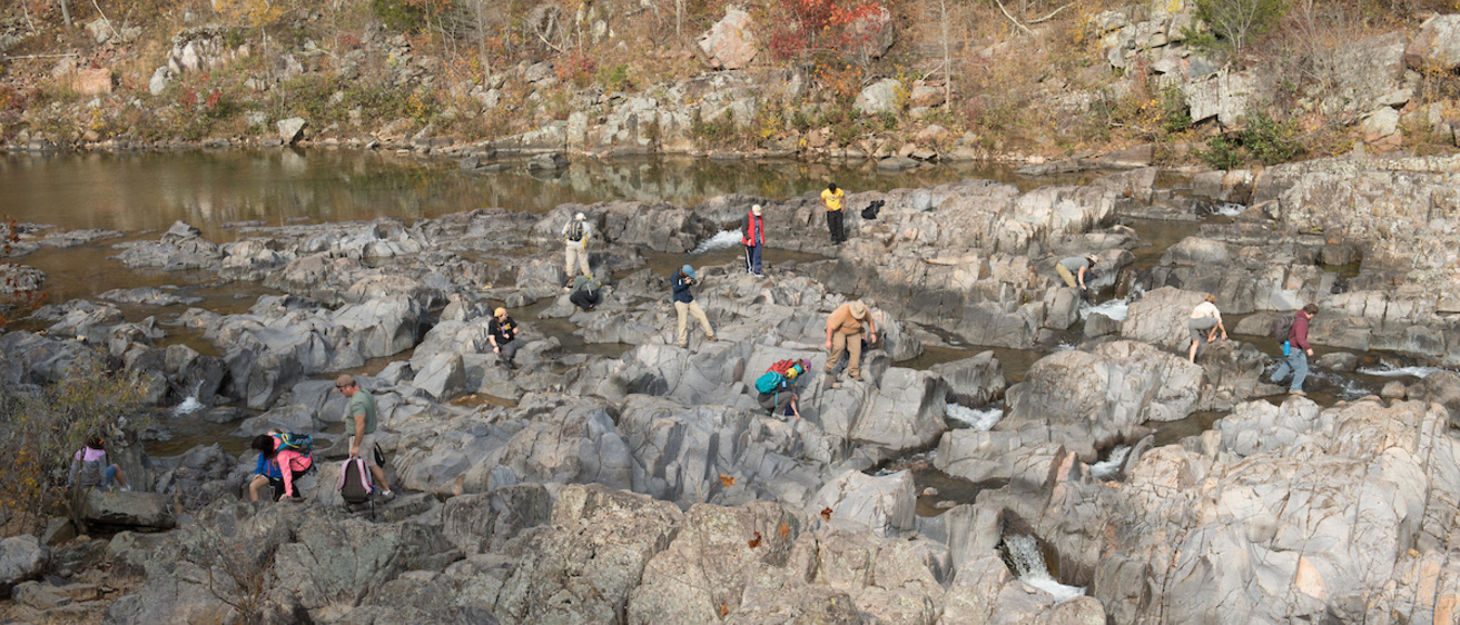 Geology students scatter amid the jagged, labyrinthine formation at Johnson’s Shut-Ins State Park.