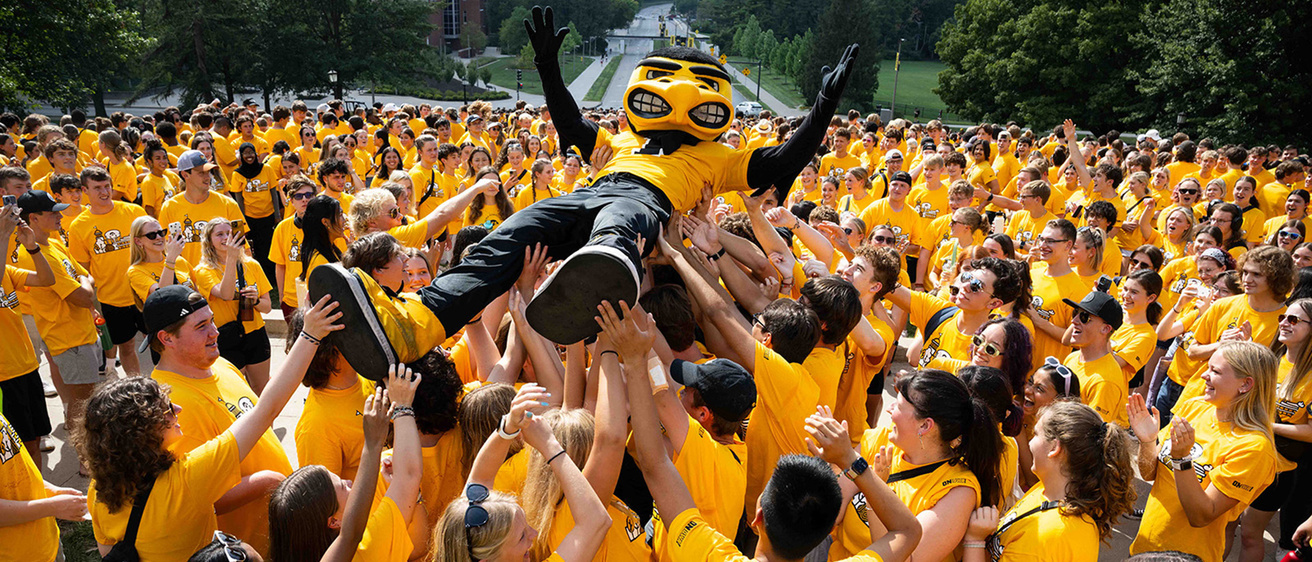 herky crowdsurfing during the Block I photo shoot on the Pentacrest