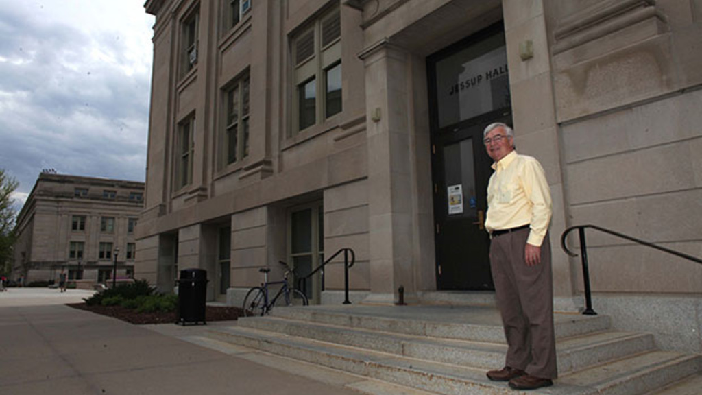 Professor Gerard Rushton stands outside Jessup Hall on Wednesday. (The Daily Iowan/Adam Wesley)