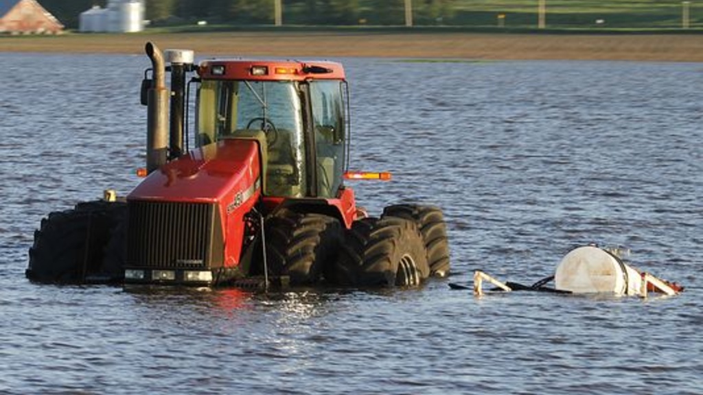 tractor in flood water