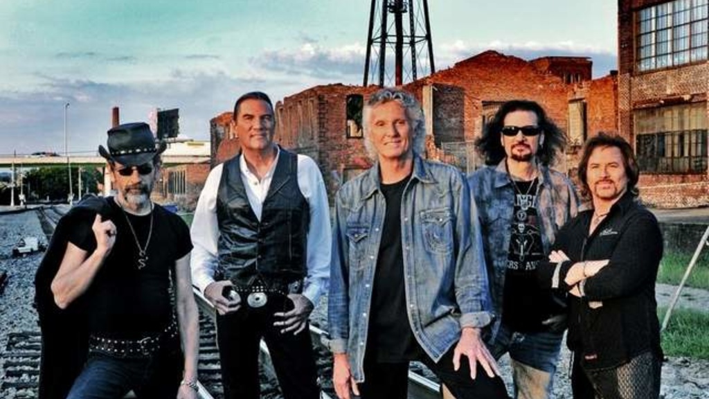 The members of the musical band Grand Funk Railroad pose for a publicity photo. The band will perform as part of the UI homecoming festivities