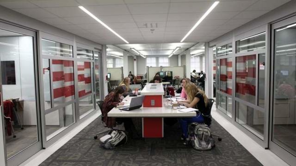 students working around a table in the Learning Commons