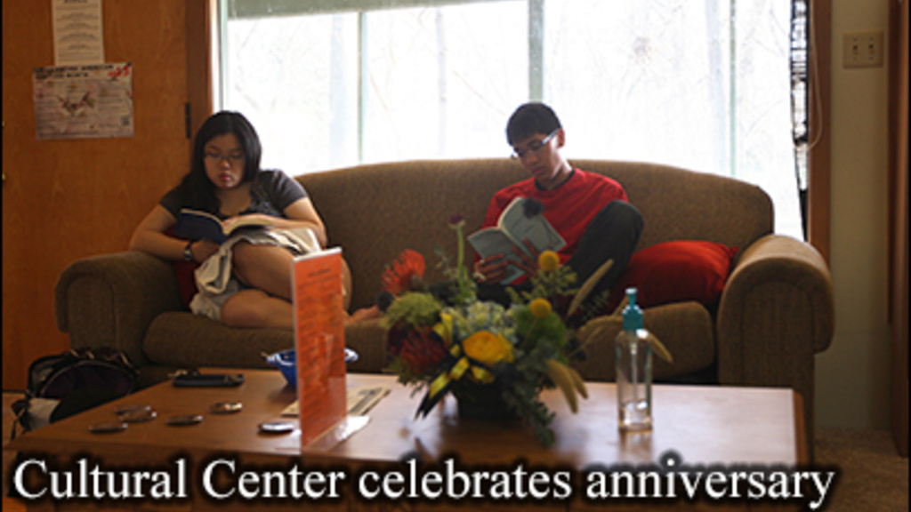 UI students relax by sitting on a couch in the UI Asian Pacific American Culture Center
