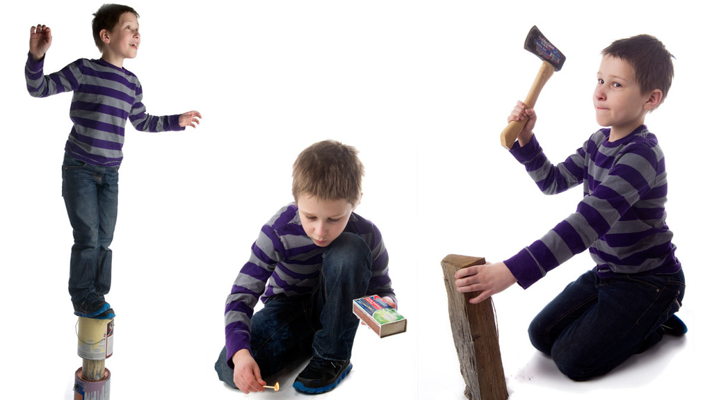A young boy does dangerous things: play with matches, climbs unsteady objects and chops wood