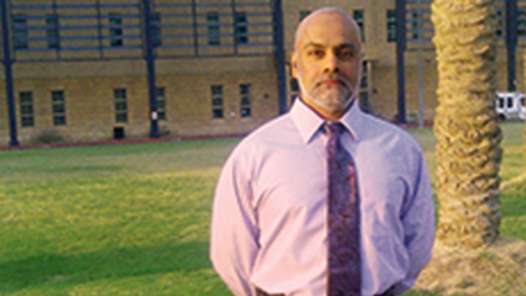 UI College of Education alumnus Krishna Das stands outside of Lindquist Center