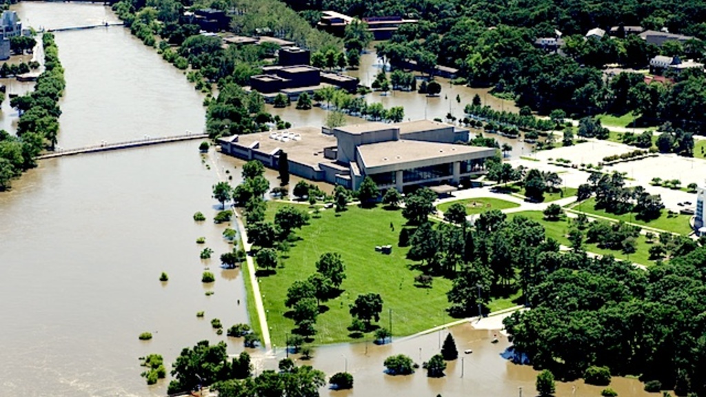 Floodwaters surround buildings on the University of Iowa arts campus
