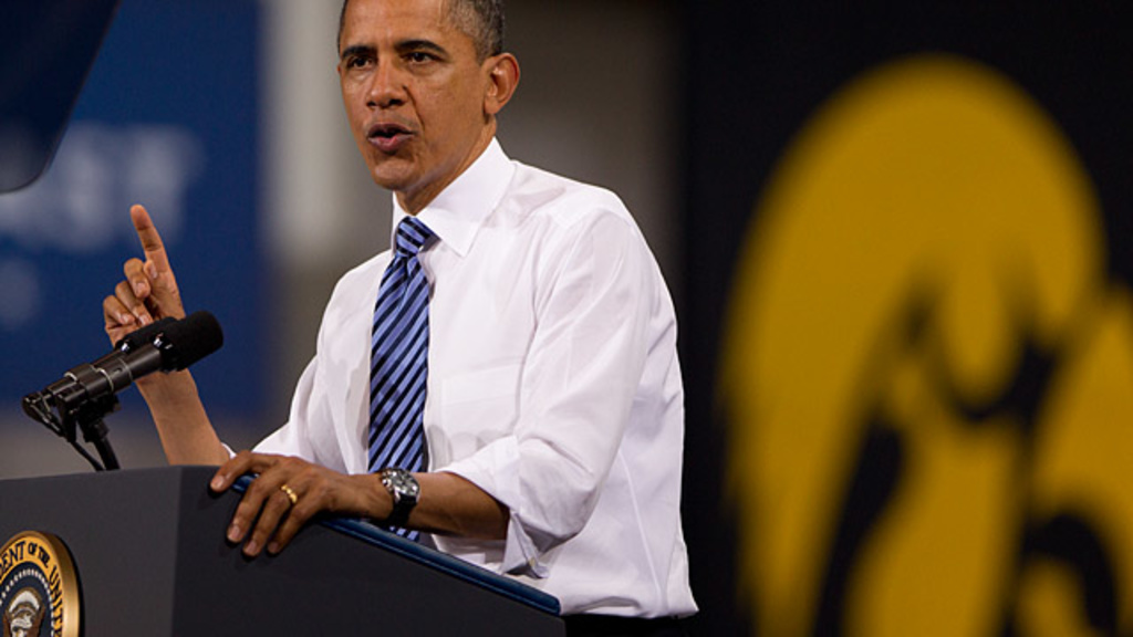 President Barack Obama in front of a Tiger Hawk banner