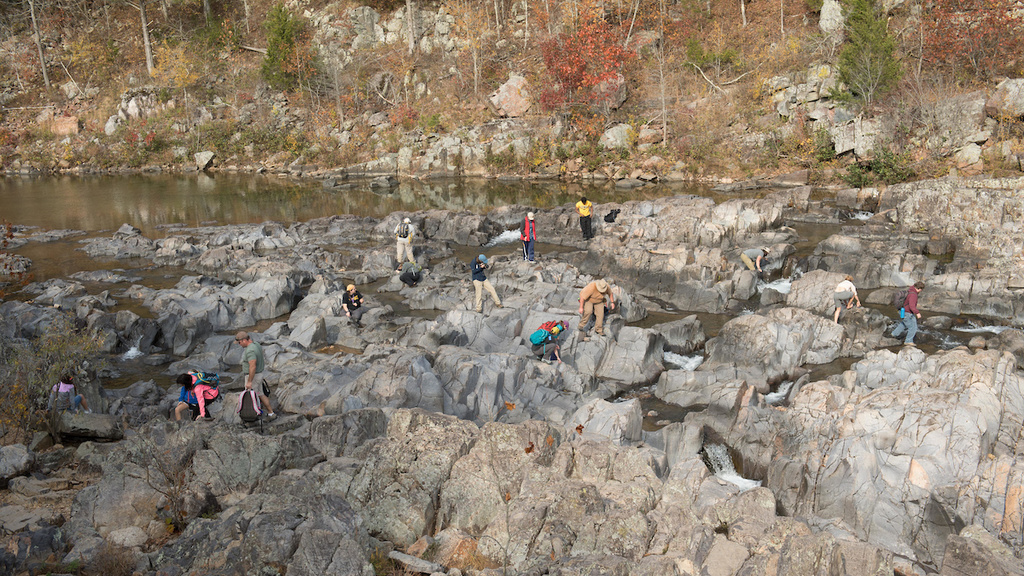Geology students scatter amid the jagged, labyrinthine formation at Johnson’s Shut-Ins State Park.