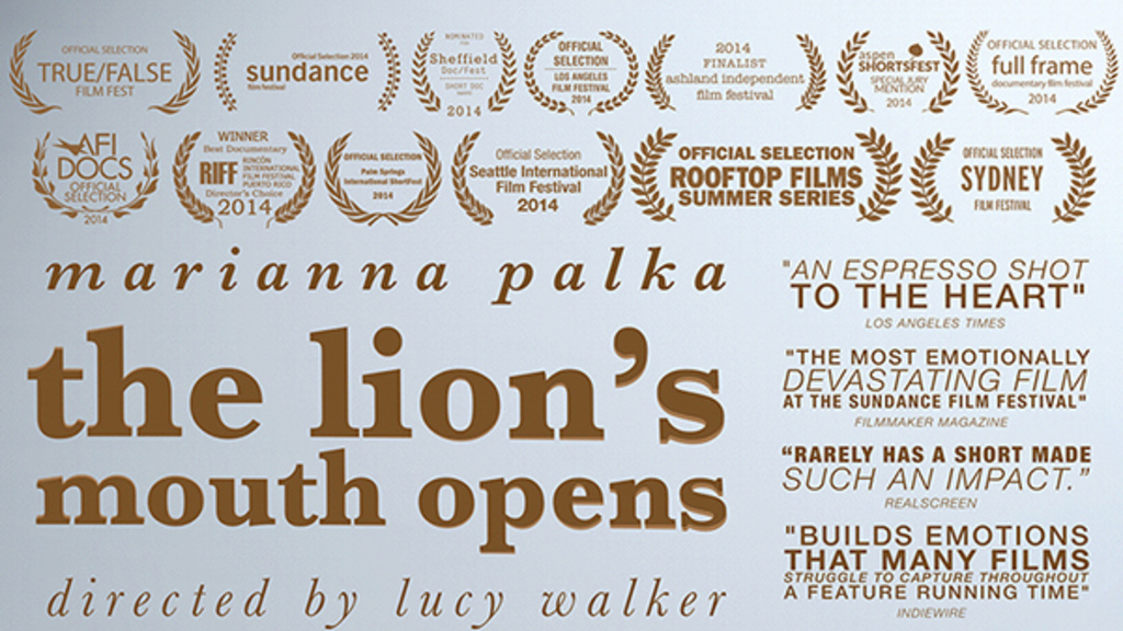 A poster depicts screening of "The Lion's Mouth Opens" documentary