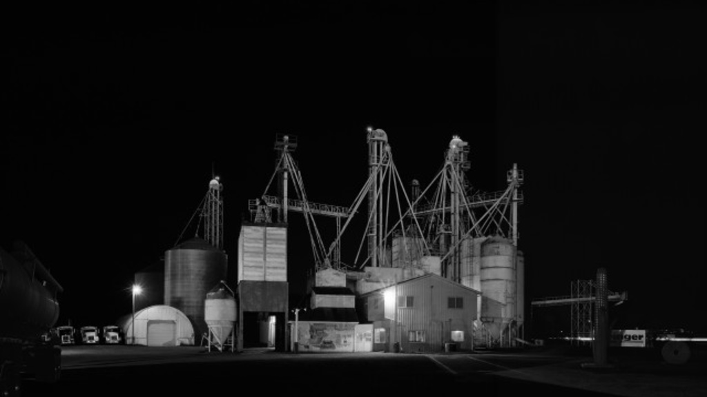 photo of industrial manufacturing plant at night