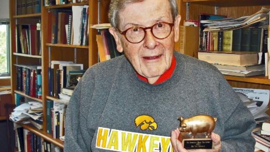 University of Iowa professor and former president, a St. Paul native, holds a Floyd of Rosedale replica