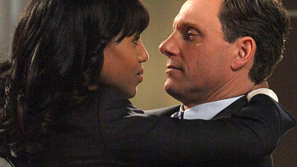 Image from the television show, Scandal, of Olivia Pope and the U.S. President in an intimate embrace