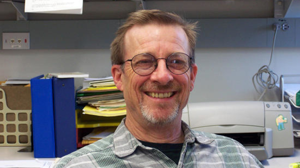 Photo of Steve Hendrix, newly named Director of Academics and Research At Iowa Lakeside Laboratory in his office
