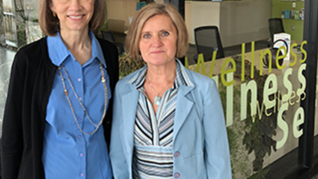 health coaches standing near wellness office